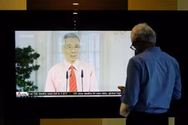 Singapore đóng cửa các trường học, công ty trong 1 tháng vì Covid-19