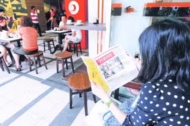 Thu phí báo chí - Cái nhìn từ châu Á