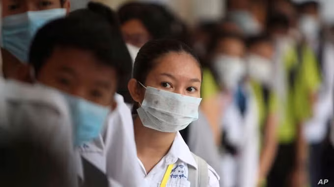 Đeo khẩu trang thời Covid-19 ở Campuchia. Ảnh minh họa.