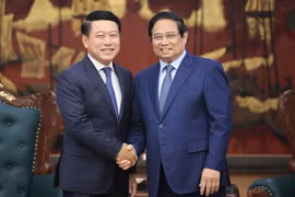 Việt Nam sẵn sàng trao đổi kinh nghiệm với Lào về cải cách, tái cơ cấu doanh nghiệp Nhà nước