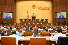 Ngày 27/6, Quốc hội biểu quyết thông qua 7 luật, 7 nghị quyết và bế mạc Kỳ họp