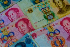 Nhân dân tệ Trung Quốc đạt đỉnh 10 tháng, vàng tăng khi Fed bị gây áp lực