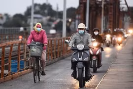 Không khí lạnh khiến miền Bắc chuyển rét, mưa rào từ đêm nay