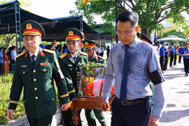 Quảng Bình: Trang nghiêm an táng 17 hài cốt liệt sỹ hy sinh trên đất bạn Lào
