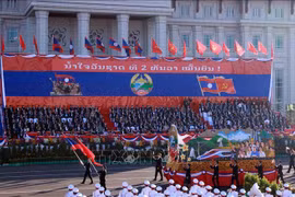 Kỷ niệm trọng thể 50 năm Quốc khánh nước Cộng hòa Dân chủ Nhân dân Lào