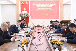 Đoàn đại biểu Nhân Dân nhật báo đến thăm và làm việc với Báo Nhân Dân
