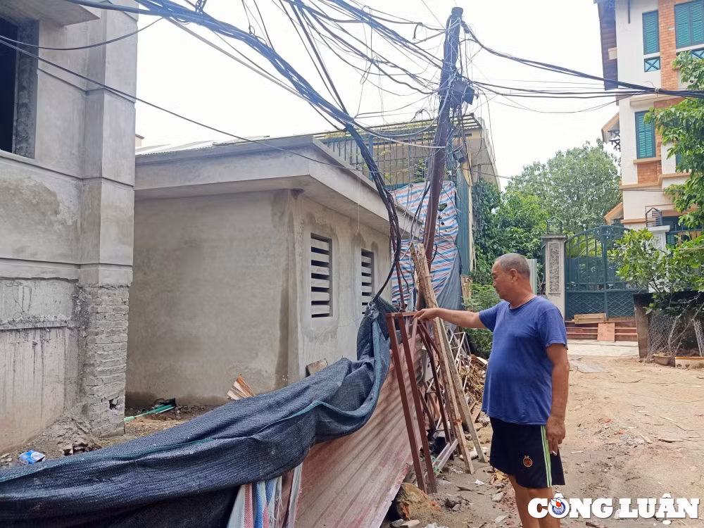 nha dan nut toac canh cong truong thi cong tru so huyen uy thanh tri hinh 7