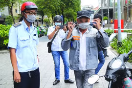TPHCM: Xử phạt nghiêm trường hợp không đeo khẩu trang nơi công cộng