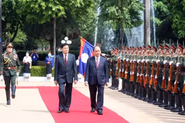 Lễ đón trọng thể Chủ tịch nước Nguyễn Xuân Phúc thăm hữu nghị CHDCND Lào