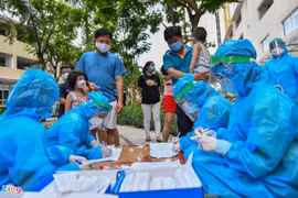 Người trở về từ vùng có dịch Covid-19, tiêm đủ liều vắc xin, được tự theo dõi sức khoẻ tại nhà trong 7 ngày