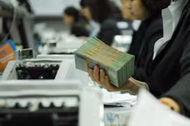 Lợi nhuận ngân hàng quý II giảm nhanh vì phải gánh chi phí dự phòng