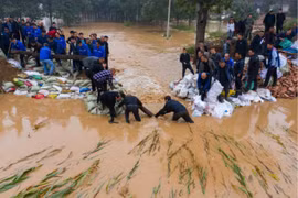 Mưa lũ khiến khai thác than ở Trung Quốc “lao đao” trong bối cảnh thiếu điện trầm trọng