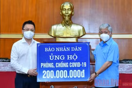 Báo Nhân Dân ủng hộ 200 triệu đồng phòng chống dịch COVID-19