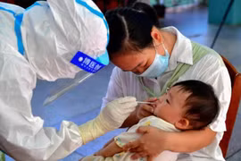 Trung Quốc chạy đua với Covid-19 để ngăn lây nhiễm của học sinh
