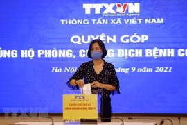 Cán bộ, nhân viên TTXVN chung tay ủng hộ công tác phòng, chống dịch COVID-19