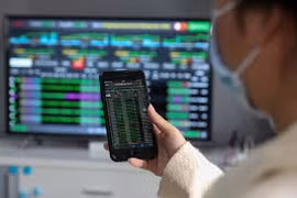 Cổ phiếu bất động sản trỗi dậy, Vn-Index bật tăng trở lại