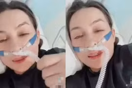 Hình ảnh Phi Nhung đeo ống thở lạc quan ca hát gây xúc động