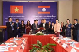 TTXVN và KPL tăng cường quan hệ hợp tác