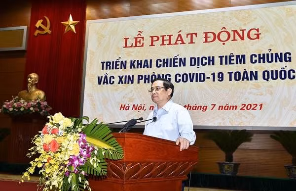 Thủ tướng Phạm Minh Chính phát động triển khai Chiến dịch tiêm chủng vaccine phòng chống COVID-19 trên toàn quốc. Ảnh: VGP