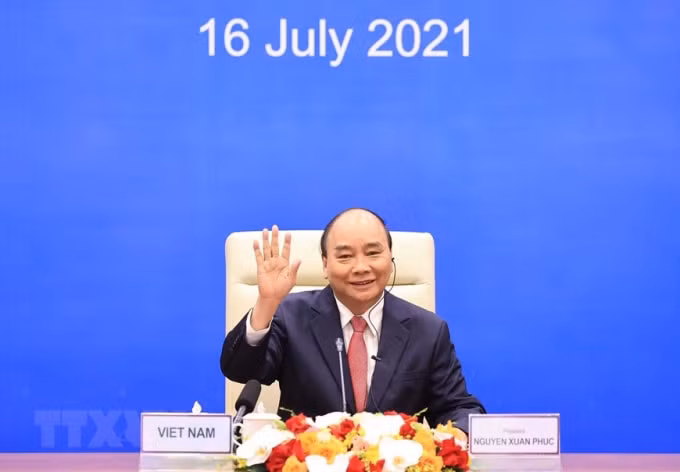 Chủ tịch nước Nguyễn Xuân Phúc tham dự cuộc họp không chính thức các nhà Lãnh đạo Kinh tế Diễn đàn hợp tác kinh tế châu Á - Thái Bình Dương. (Ảnh: TTXVN)