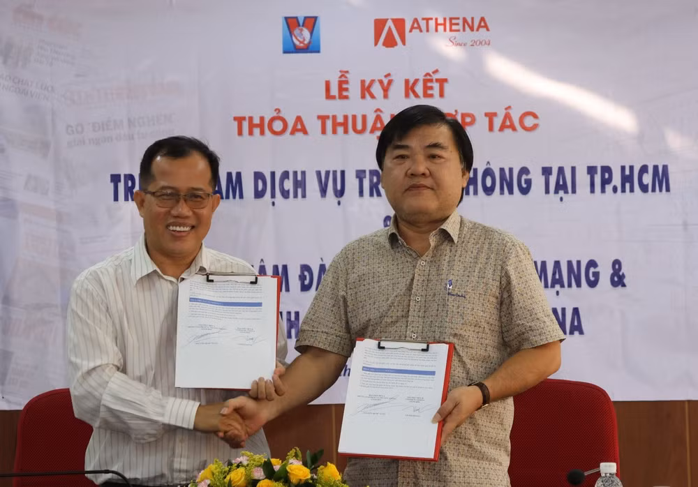 co quan ttxvn khu vuc phia nam va athena ki ket ve truyen thong va an ninh mang hinh 1