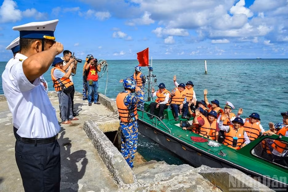 A group of people on a boat AI-generated content may be incorrect.