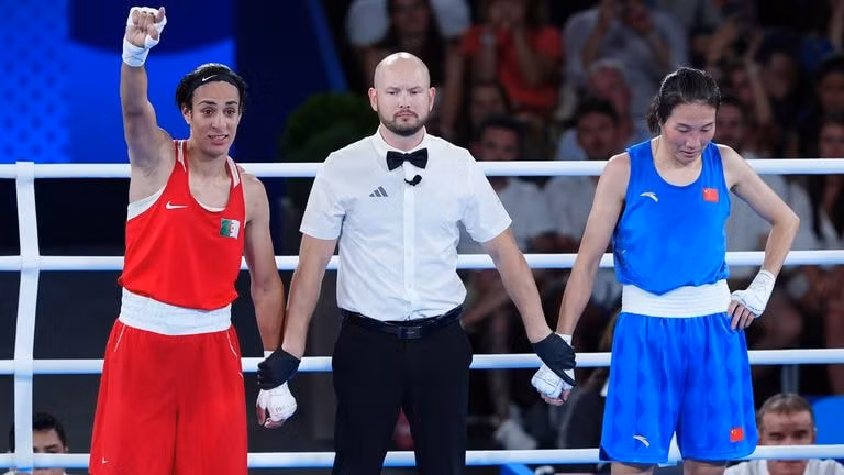 Algeria's Imane Khelif (left) celebrates victory over China's Liu Yang at the 2024 Paris Olympics. Pic: PA