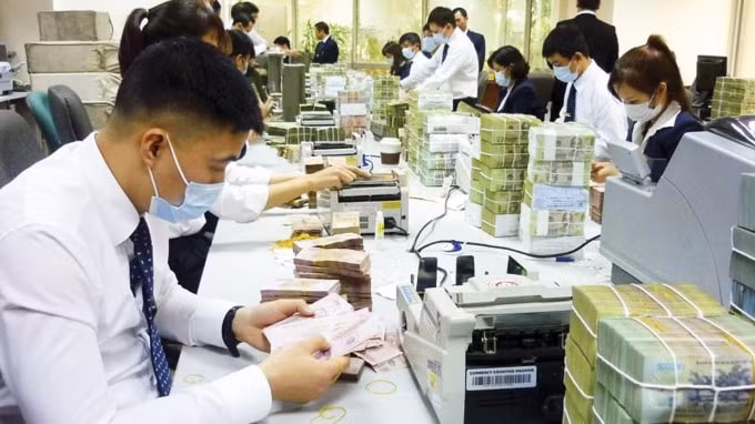Hiệu quả cuộc chiến chống đại dịch COVID-19 sẽ quyết định bức tranh ngành ngân hàng năm 2021.