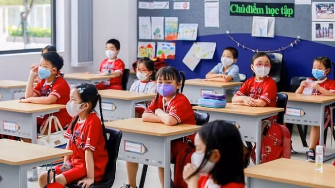 Học sinh TP. Hồ Chí Minh đi học trở lại vào ngày 1/3 (ảnh TL).