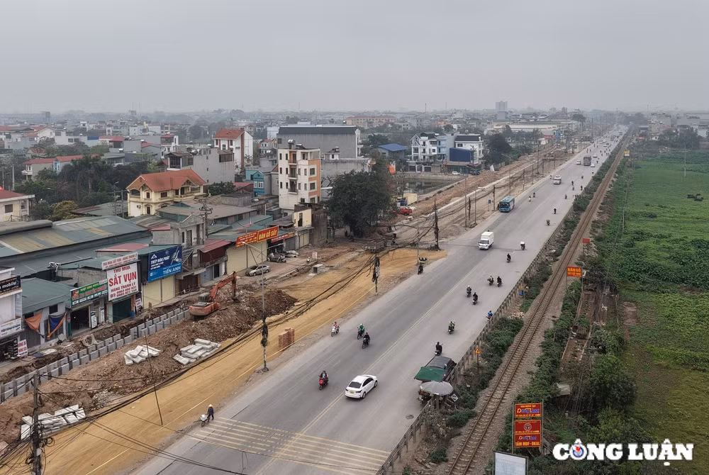 ha noi cai tao nang cap gan 5km duong quoc lo 1a 15 nam chua xong hinh 1