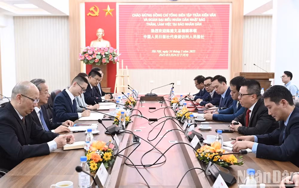doan dai bieu nhan dan nhat bao den tham va lam viec voi bao nhan dan hinh 1