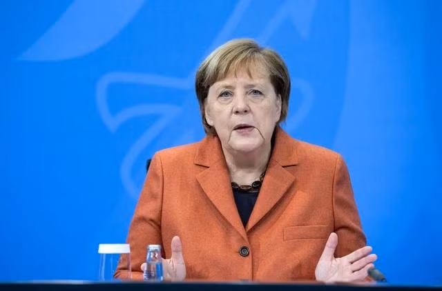 Bà Angela Merkel cho biết Đức sẽ áp dụng biện pháp phong tỏa để ngăn chặn sự lây lan của virus Corona - Ảnh: Reuters