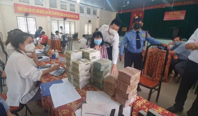 Chi trả cho 500 hộ dân gần 1.000 tỷ tiền đền bù GPMB sân bay Long Thành. Ảnh: TL.