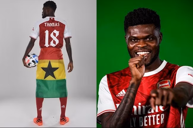 Hình ảnh tiền vệ Partey quấn lá cờ Ghana một cách đầy tự hào khi ra mắt đội bóng mới. Ảnh: bongda24h.