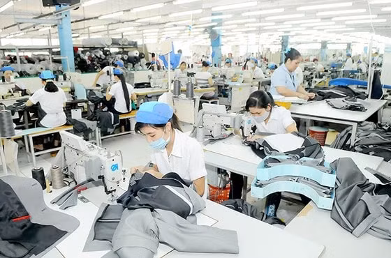 Hàng dệt may Việt Nam đảm bảo quy tắc xuất xứ sẽ hưởng ưu đãi vào EU. Ảnh TL