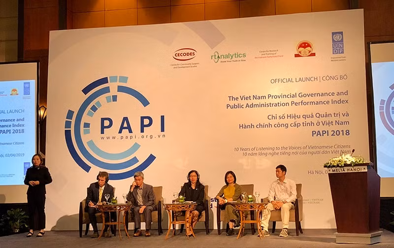 Các đại biểu Trao đổi tại Lễ công bố Chỉ số PAPI 2018. Ảnh: Hương Giang