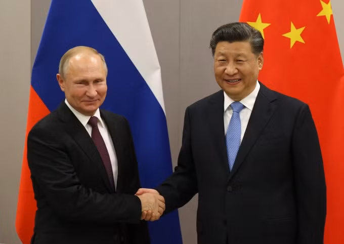 Tổng thống Putin (trái) và Chủ tịch Trung Quốc Tập Cận Bình - Ảnh: Getty
