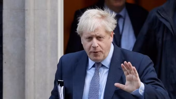 Thủ tướng Anh Boris Johnson hoãn gỡ các hạn chế phong tỏa COVID-19 - Ảnh: AFP