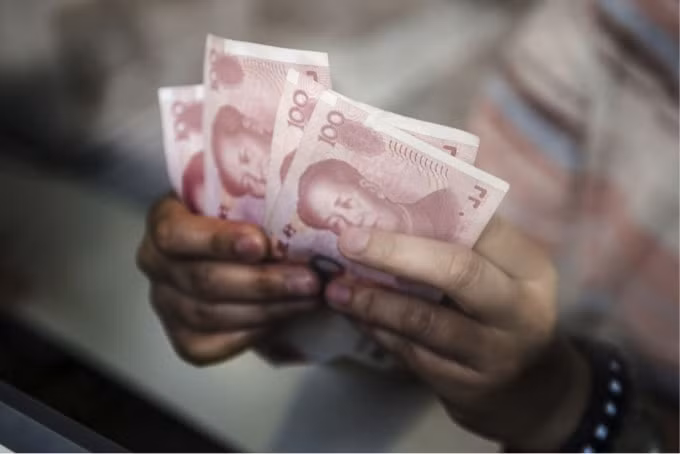 Đồng nhân dân tệ trượt giá sau thông tin của Fed. Ảnh: Getty.