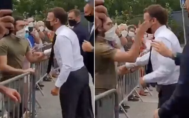 Một người đàn ông bất ngờ tát Tổng thống Macron trong lúc ông bắt tay người người dân trong một cuộc dạo chơi ở vùng Drome của Pháp - Ảnh: Cắt từ video