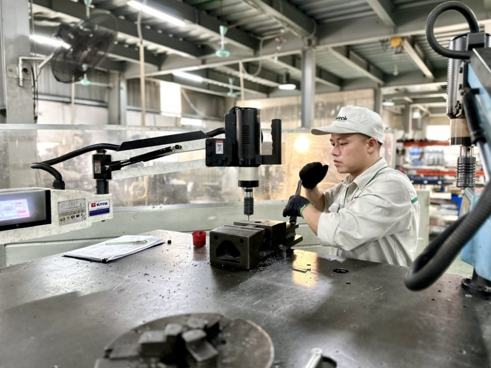 Sản xuất công nghiệp duy trì tốc độ tăng trưởng 2 con số. Ảnh: HD 077c1b6cb59a3ac4638b20260106152106.jpg