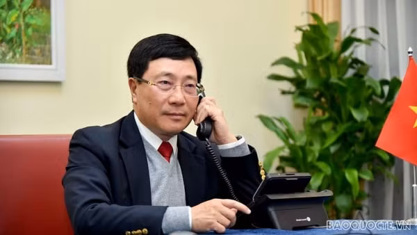 Phó Thủ tướng Phạm Bình Minh điện đàm Cố vấn An ninh quốc gia Hoa Kỳ về việc điều tra chính sách tiền tệ của Việt Nam. Ảnh: baoquocte.vn