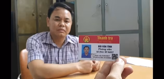 Đối tượng Bùi Văn Tính làm việc với cơ quan chức năng.