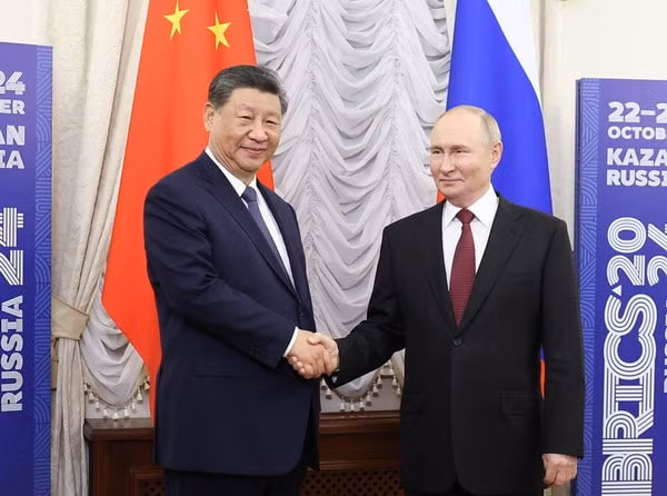 hai ong tap can binh va vladimir putin dien dam khi chien su ukraine tron 3 nam hinh 1