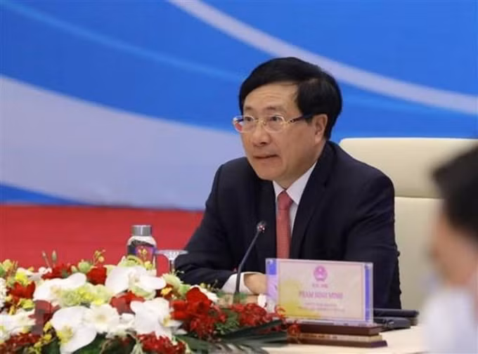 Phó Thủ tướng Chính phủ Phạm Bình Minh phát biểu tại tọa đàm. Ảnh: TTXVN