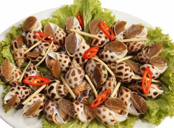 Một người chết, 7 người nguy kịch nghi trúng độc do ăn ốc biển. Ảnh TL.