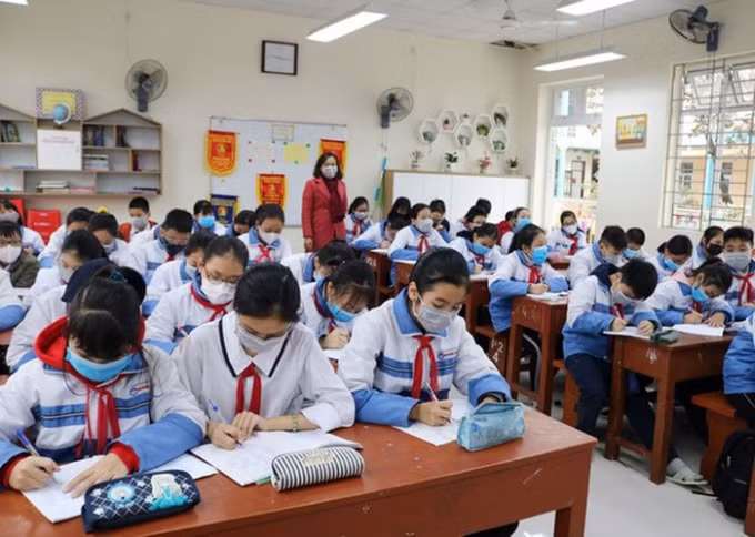 Học sinh đeo khẩu trang trong lớp học đề phòng lây nhiễm virus corona. Ảnh minh họa.