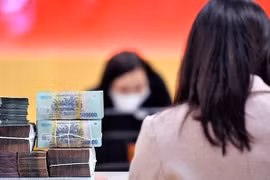 Ngân hàng Nhà nước sẽ xử lý nghiêm ngân hàng ép khách mua bảo hiểm