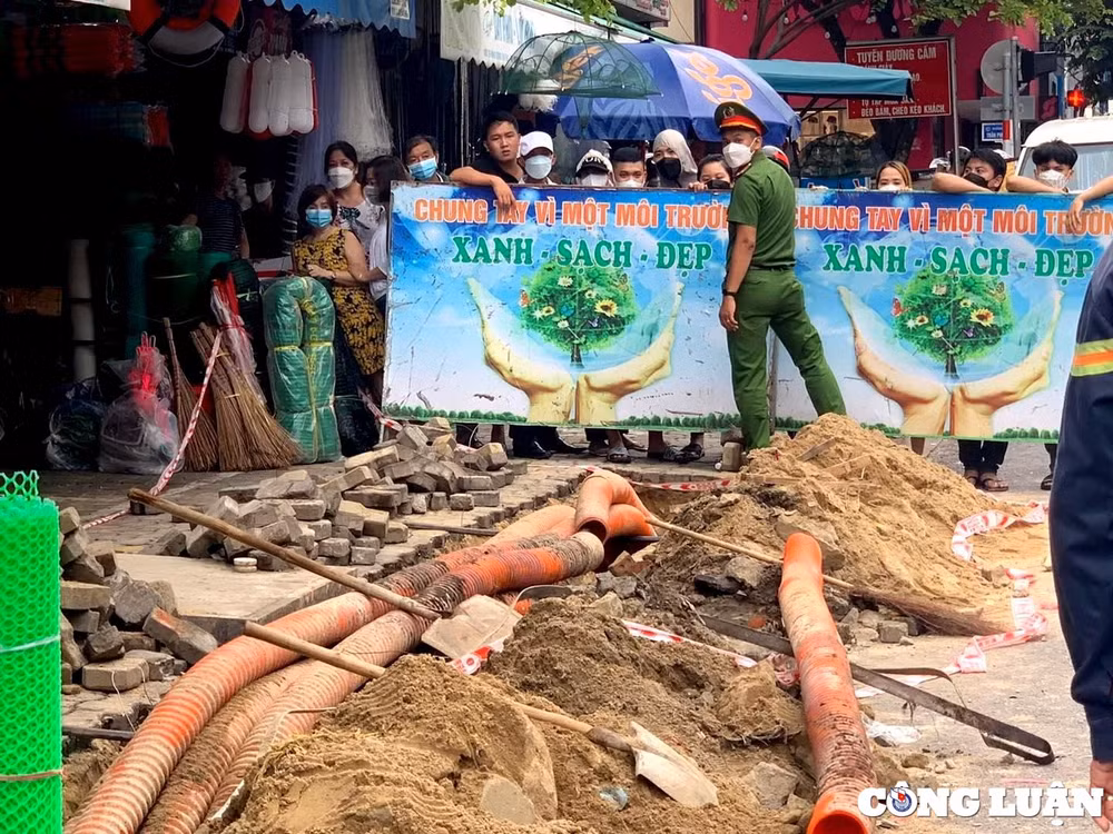 da nang xac dinh danh tinh thi the duoi cong o canh cho han hinh 1