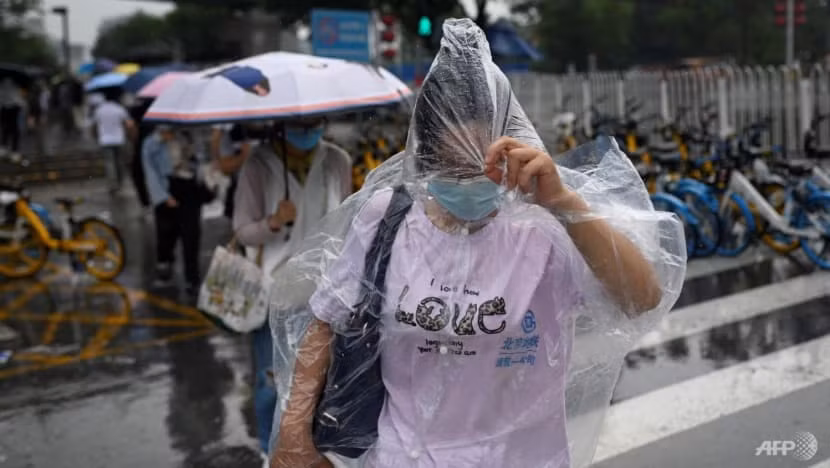Mưa lớn đang khiến nhiều thành phố của Trung Quốc bị ngập nặng. Ảnh: AFP